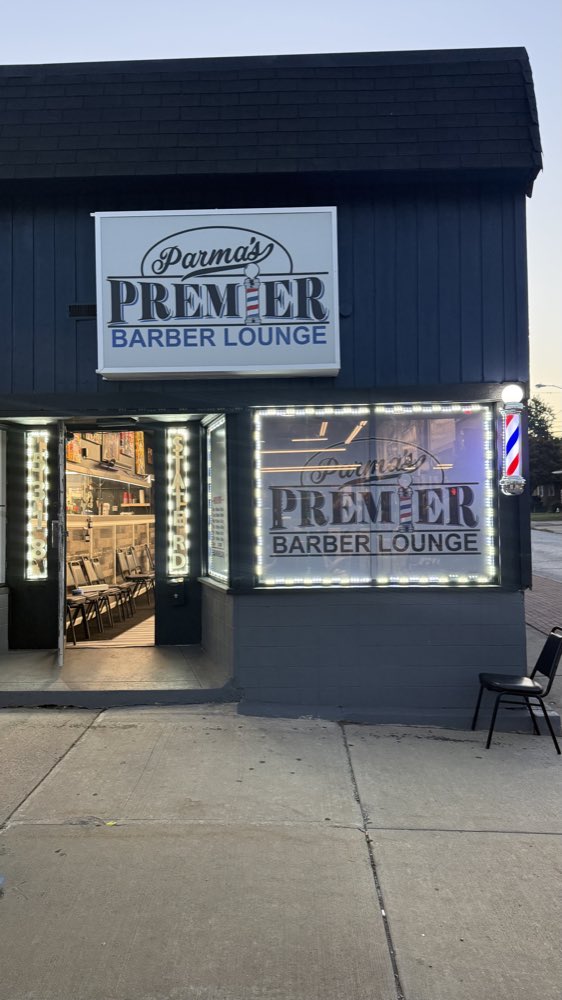 Fresh haircut and beard grooming result in Parma lounge.