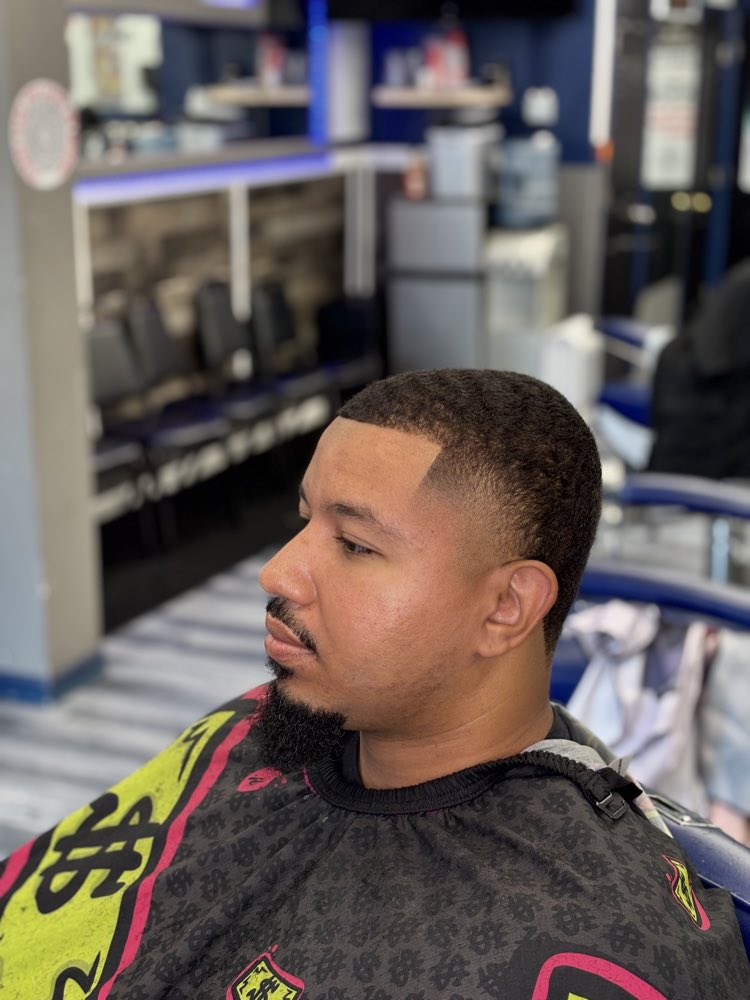 Precision haircut and styling result at Parma barbershop.